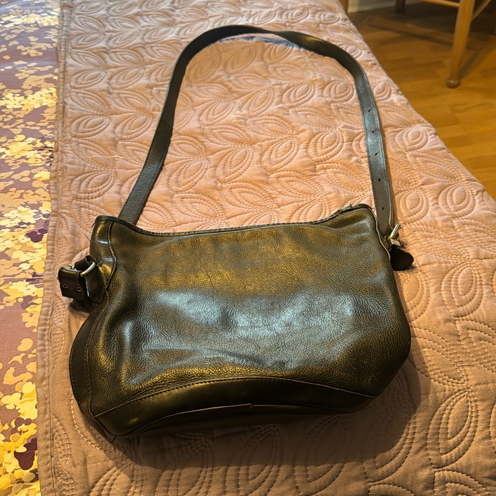 Roots leather bag